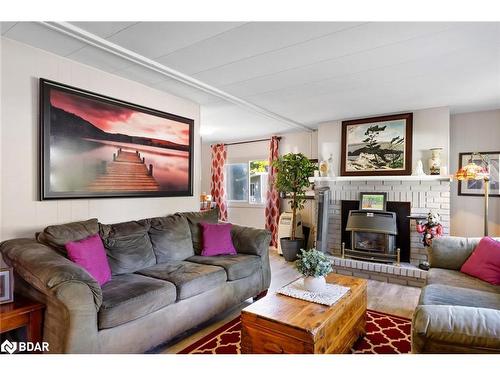 15 Maple Court, Innisfil, ON - Indoor Photo Showing Living Room With Fireplace