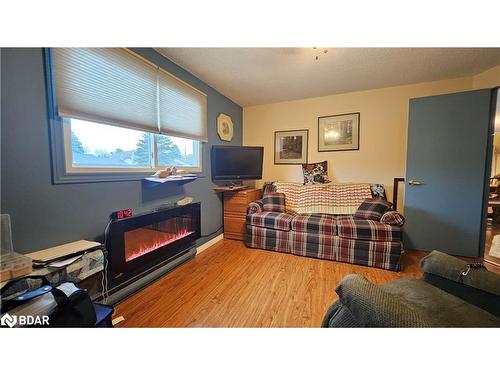 110 Shakespeare Crescent, Barrie, ON - Indoor Photo Showing Bedroom With Fireplace