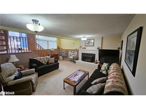 110 Shakespeare Crescent, Barrie, ON - Indoor Photo Showing Living Room With Fireplace