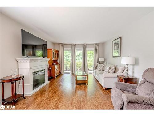 212-10 Coulter Street, Barrie, ON - Indoor Photo Showing Living Room With Fireplace