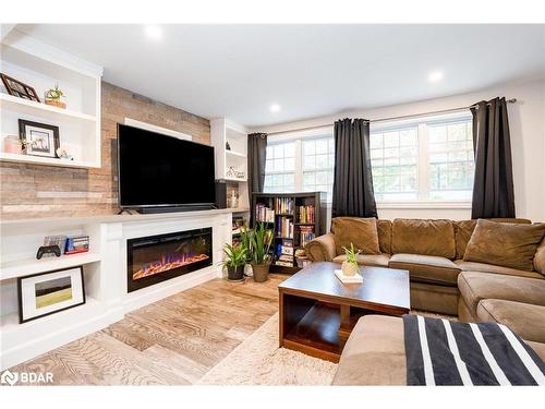 33 Frank Street, Wasaga Beach, ON - Indoor Photo Showing Living Room With Fireplace