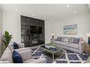 28 Sanford Circle, Springwater, ON  - Indoor Photo Showing Living Room With Fireplace 