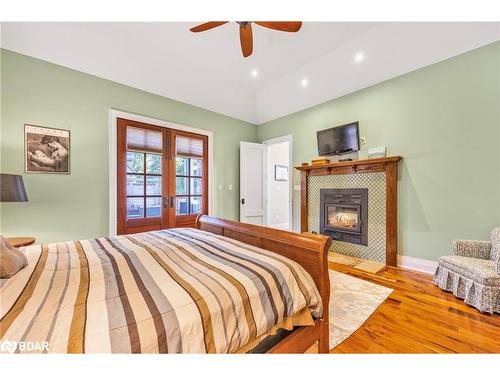 3967 Guest Road, Innisfil, ON - Indoor Photo Showing Bedroom With Fireplace