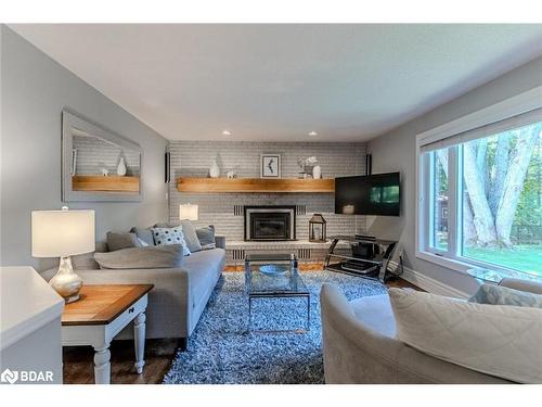 48 Lawrence Avenue, Minesing, ON - Indoor Photo Showing Living Room With Fireplace