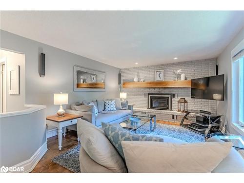 48 Lawrence Avenue, Minesing, ON - Indoor Photo Showing Living Room With Fireplace