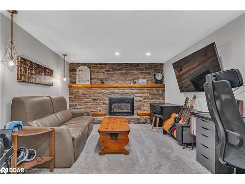 10 Birchwood Drive, Barrie, ON - Indoor Photo Showing Living Room With Fireplace