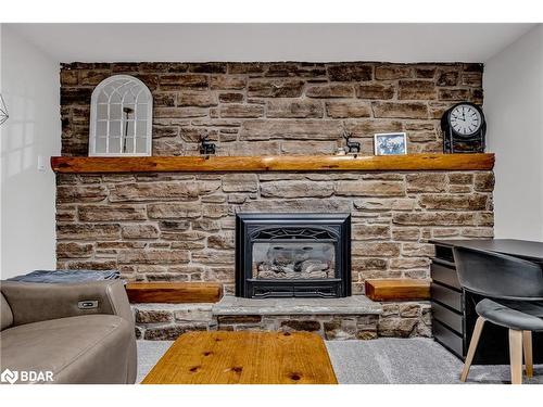 10 Birchwood Drive, Barrie, ON - Indoor Photo Showing Living Room With Fireplace