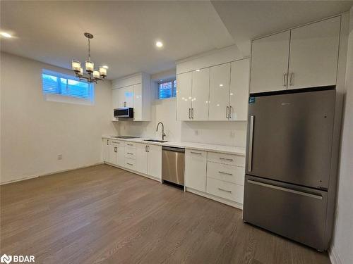 Basement-63 Victoria Wood Avenue, Springwater, ON - Indoor Photo Showing Kitchen With Stainless Steel Kitchen