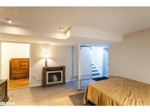 214 Sutherland Crescent, Cobourg, ON - Indoor Photo Showing Bedroom With Fireplace