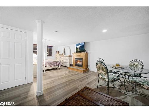 12 Riverdale Drive, Wasaga Beach, ON - Indoor With Fireplace