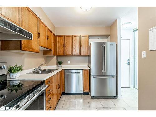 301-1047 Mississaga Street West, Orillia, ON - Indoor Photo Showing Kitchen With Stainless Steel Kitchen With Double Sink