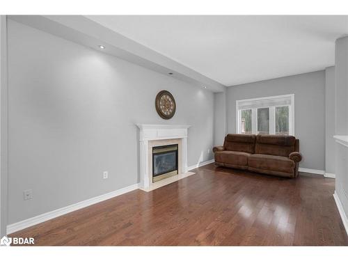 1951 Swan Street, Innisfil, ON - Indoor Photo Showing Living Room With Fireplace