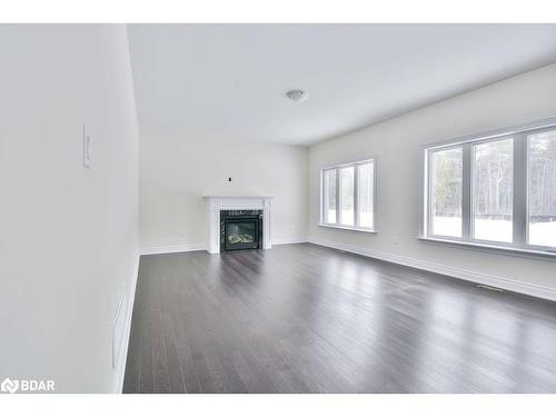 24 Cottonwood Street, Anten Mills, ON - Indoor Photo Showing Living Room With Fireplace