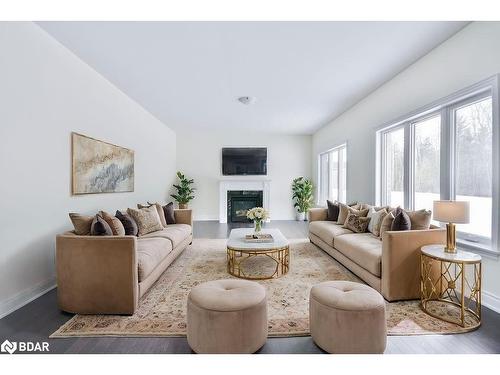 24 Cottonwood Street, Anten Mills, ON - Indoor Photo Showing Living Room With Fireplace