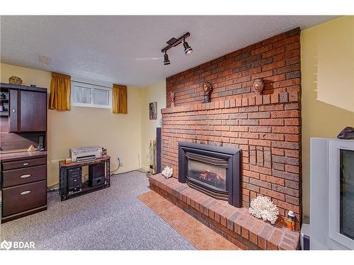 63 Bronte Crescent, Barrie, ON - Indoor Photo Showing Living Room With Fireplace