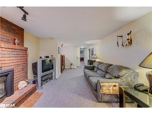 63 Bronte Crescent, Barrie, ON - Indoor Photo Showing Living Room With Fireplace