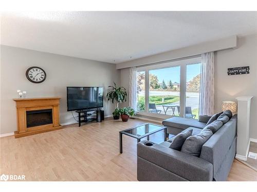 605 Big Bay Point Road, Barrie, ON - Indoor Photo Showing Living Room With Fireplace