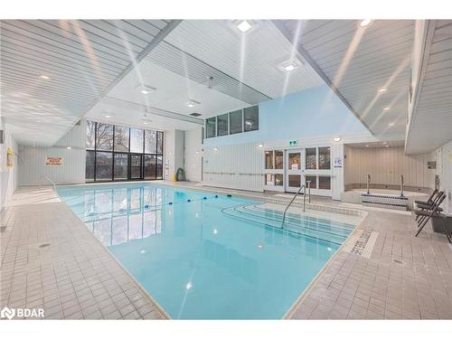 104-181 Collier Street, Barrie, ON - Indoor Photo Showing Other Room With In Ground Pool