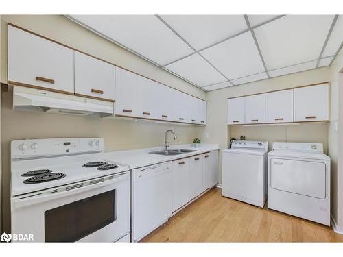 104-181 Collier Street, Barrie, ON - Indoor Photo Showing Laundry Room