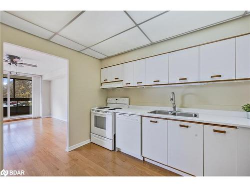 104-181 Collier Street, Barrie, ON - Indoor Photo Showing Kitchen With Double Sink