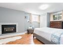 795744 Grey Road 19, The Blue Mountains, ON  - Indoor Photo Showing Bedroom With Fireplace 