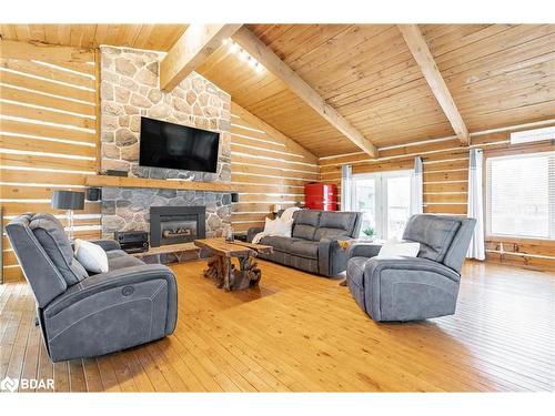 795744 Grey Road 19, The Blue Mountains, ON - Indoor Photo Showing Living Room With Fireplace