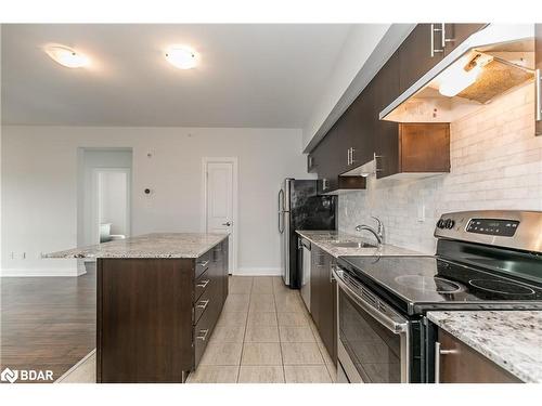 310-299 Cundles Road E, Barrie, ON - Indoor Photo Showing Kitchen With Stainless Steel Kitchen