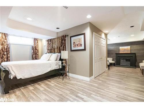 1826 Quantz Crescent, Innisfil, ON - Indoor Photo Showing Bedroom With Fireplace