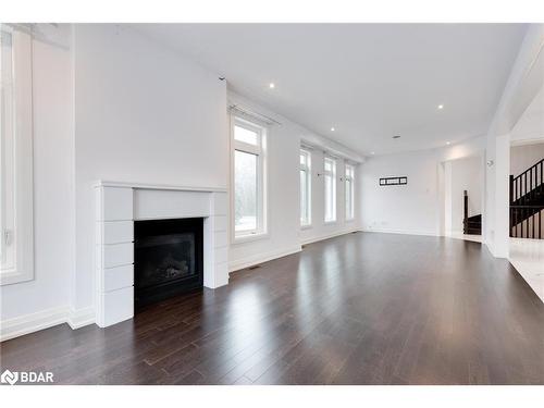 1147 Arnold Street, Innisfil, ON - Indoor Photo Showing Living Room With Fireplace