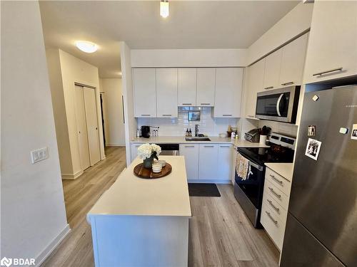 1207-385 Winston Road, Niagara Falls, ON - Indoor Photo Showing Kitchen With Double Sink