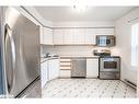 36-120 D'Ambrosio Drive, Barrie, ON  - Indoor Photo Showing Kitchen With Double Sink 