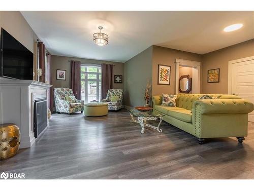 1147 Old Creamery Road, Severn, ON - Indoor Photo Showing Living Room With Fireplace