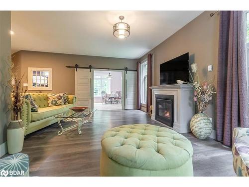 1147 Old Creamery Road, Severn, ON - Indoor Photo Showing Living Room With Fireplace