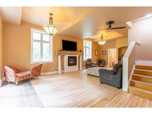 1147 Old Creamery Road, Severn, ON - Indoor Photo Showing Living Room With Fireplace