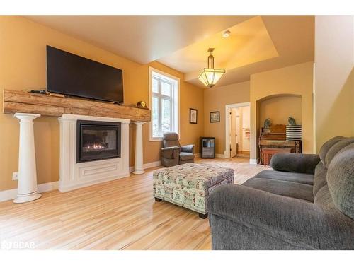 1147 Old Creamery Road, Severn, ON - Indoor Photo Showing Living Room With Fireplace