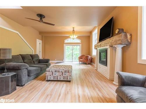 1147 Old Creamery Road, Severn, ON - Indoor Photo Showing Living Room With Fireplace