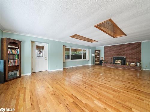 3146 Wasdell Falls Road, Washago, ON - Indoor Photo Showing Living Room With Fireplace