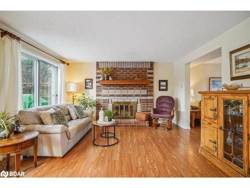 69 Irwin Drive, Barrie, ON - Indoor Photo Showing Living Room With Fireplace