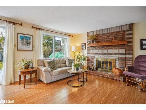 69 Irwin Drive, Barrie, ON - Indoor Photo Showing Living Room With Fireplace