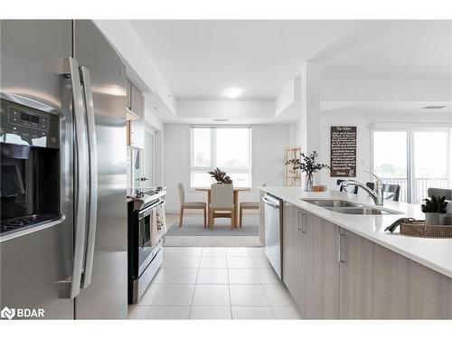 302-6 Spice Way, Barrie, ON - Indoor Photo Showing Kitchen With Double Sink With Upgraded Kitchen