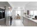 302-6 Spice Way, Barrie, ON  - Indoor Photo Showing Kitchen With Double Sink With Upgraded Kitchen 