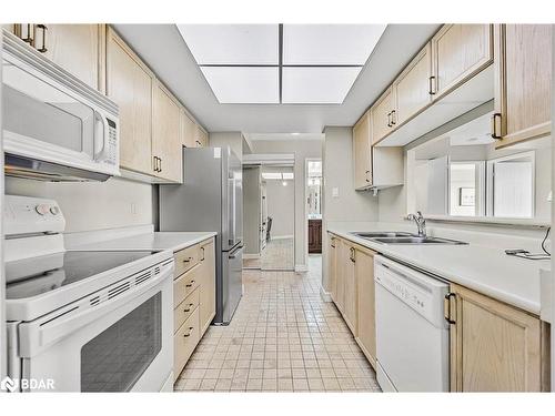 205-65 Ellen Street, Barrie, ON - Indoor Photo Showing Kitchen With Double Sink