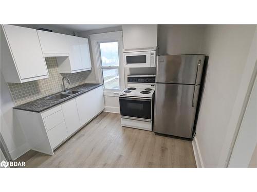 15 Frances Street N, Barrie, ON - Indoor Photo Showing Kitchen With Double Sink