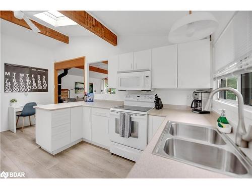 150 Moreau Parkway, Tiny, ON - Indoor Photo Showing Kitchen With Double Sink