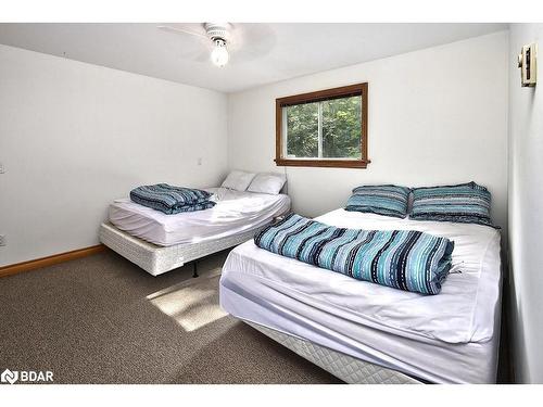 1046 Pine Springs Road, Algonquin Highlands, ON - Indoor Photo Showing Bedroom