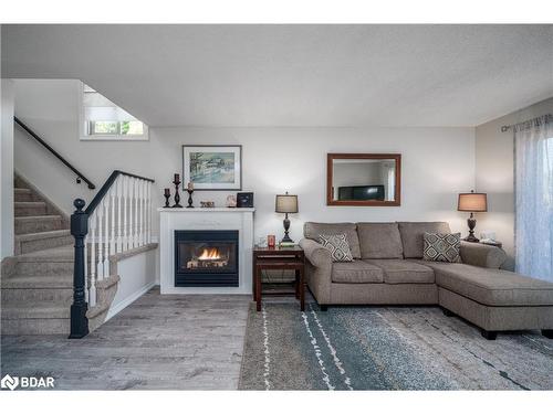 36-2 Sawmill Road, Barrie, ON - Indoor Photo Showing Living Room With Fireplace