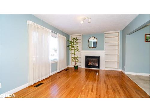 65 Strabane Avenue, Barrie, ON - Indoor Photo Showing Living Room With Fireplace