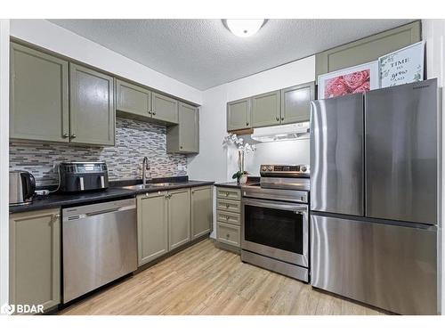 I7-63 Ferris Lane, Barrie, ON - Indoor Photo Showing Kitchen With Stainless Steel Kitchen