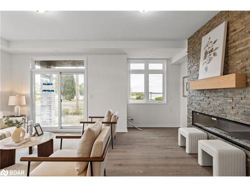 12 Wyn Wood Lane, Orillia, ON - Indoor Photo Showing Living Room With Fireplace