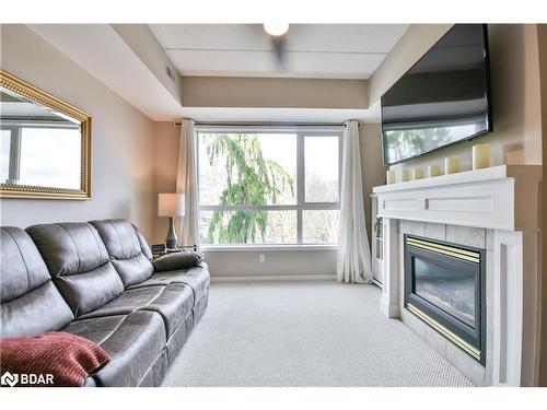 3012-750 Johnston Park Avenue, Collingwood, ON - Indoor Photo Showing Living Room With Fireplace